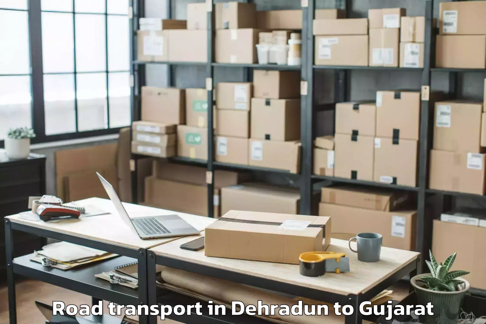 Get Dehradun to Mahesana Road Transport